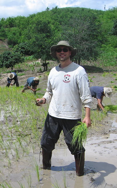 man planting rice