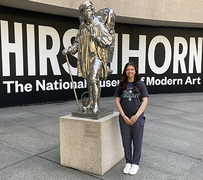 Eleanor Pugh standing outside the Hirschorn Museum in D.C.